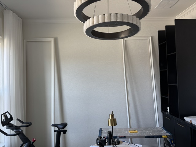 Office wall trim paneling installed, room still in progress